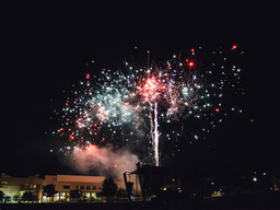 Photo of fireworks in the night sky over Albin O. Kuhn Library