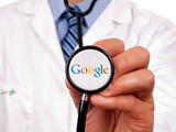Healthcare working holding a Google input device.